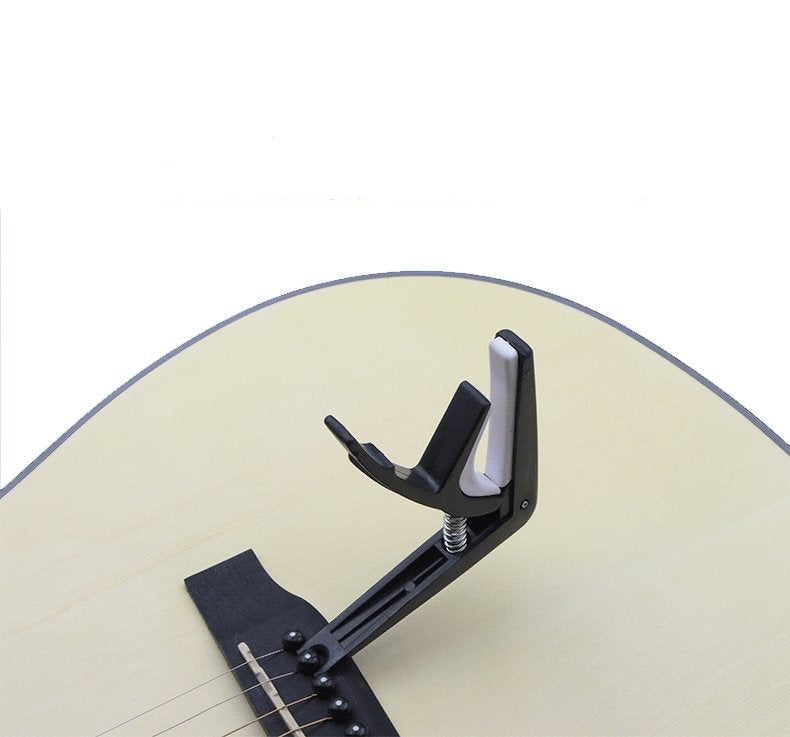 ABS 2-in-1 capo，Adjustable plastic pegs，Remove the nail
